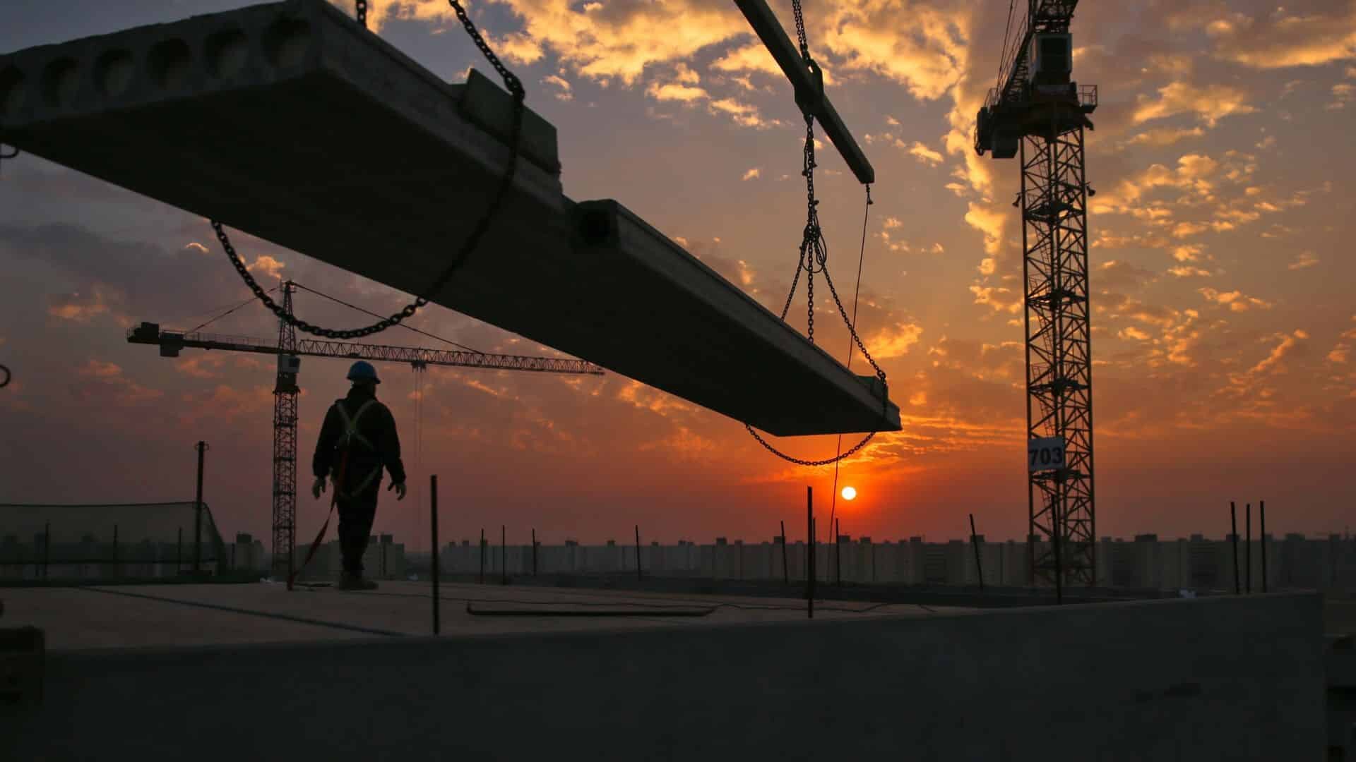 construction worker overlooking a jobsite