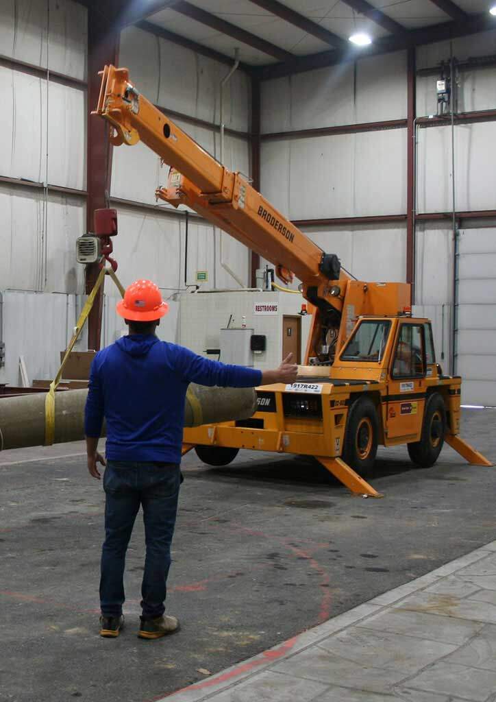 laborer apprentice directing equipment
